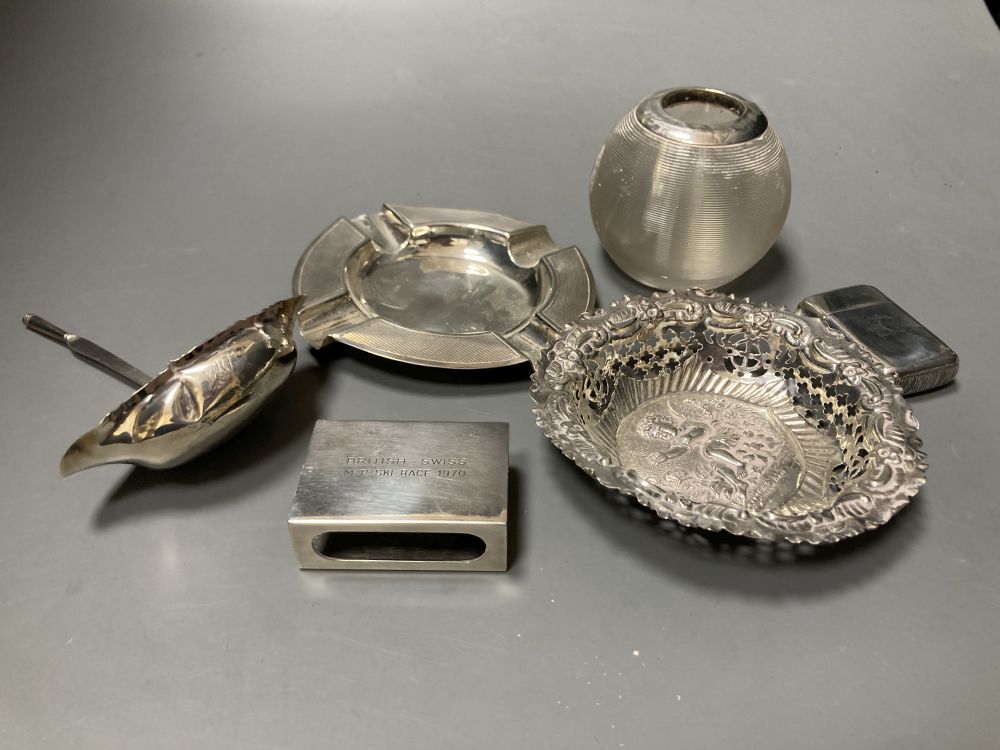 Five small silver items & a plated match sleeve.